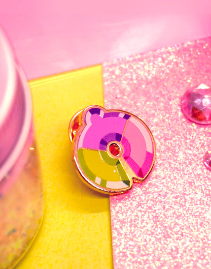 Colorful disco ball on a pink and yellow background